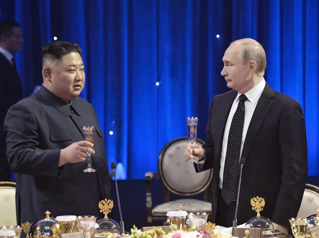 Kim Jong-un (kiri) dan Vladimir Putin (kanan)