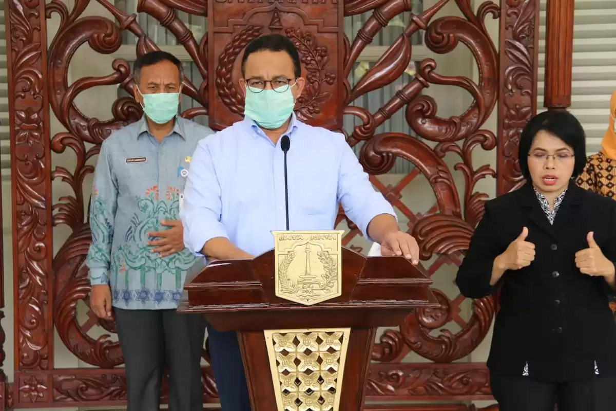 Penanganan Corona Anies vs Risma