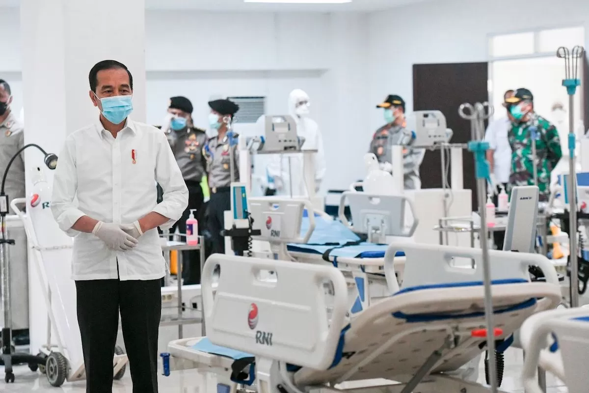 Damai dengan Corona ala Jokowi WHO
