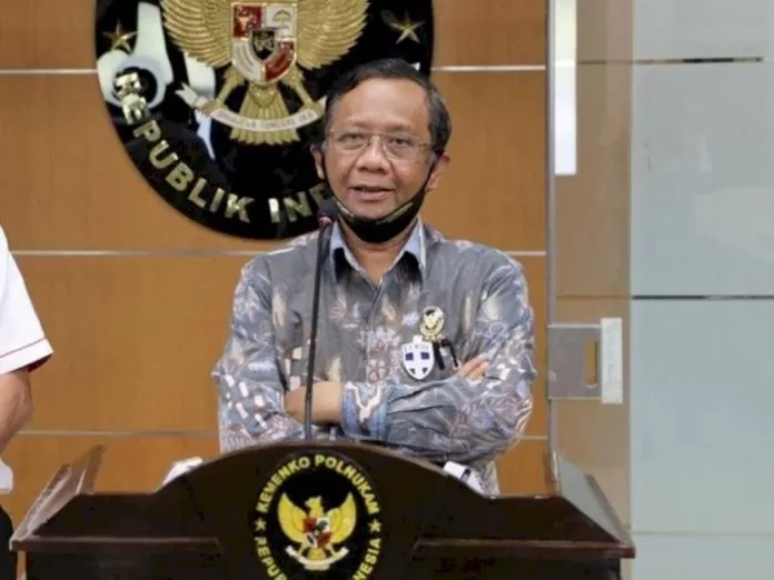 Mahfud MD dan Jawaban Polisi Siber